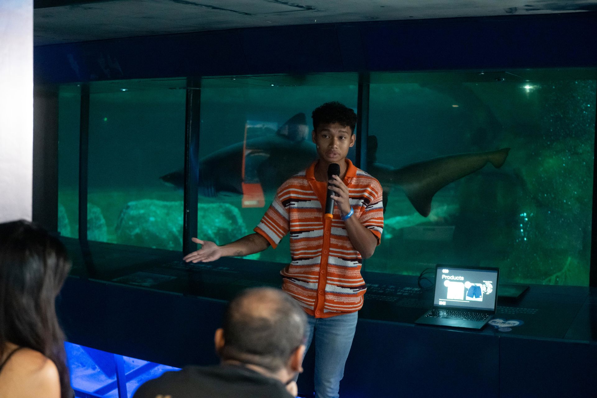 Photo shows a "Shark Tank" style pitch competition held during the Explore the Innovation Ocean event to empower and showcase innovative ideas from the younger generation.