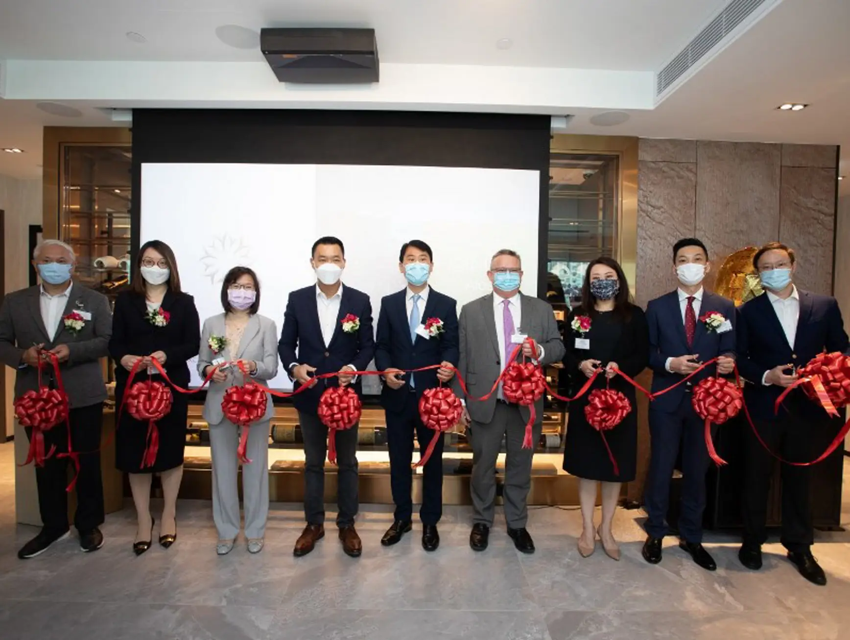 Alosi Ribbon Cutting Group Photo