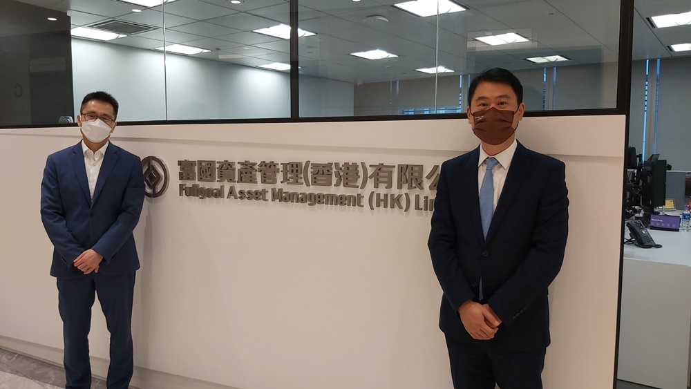 Chief Executive Officer and Responsible Officer, Mr Zhang Lixin (left) and Head of Financial Services and Global Head of Family Office, InvestHK, Mr Dixon Wong