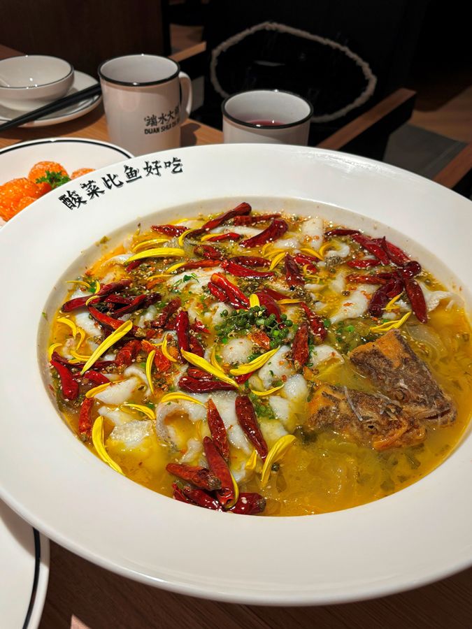 One of its signature dishes, suancai fish